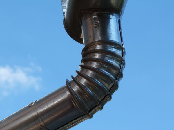 Metal Downspout Installation in Rockwall