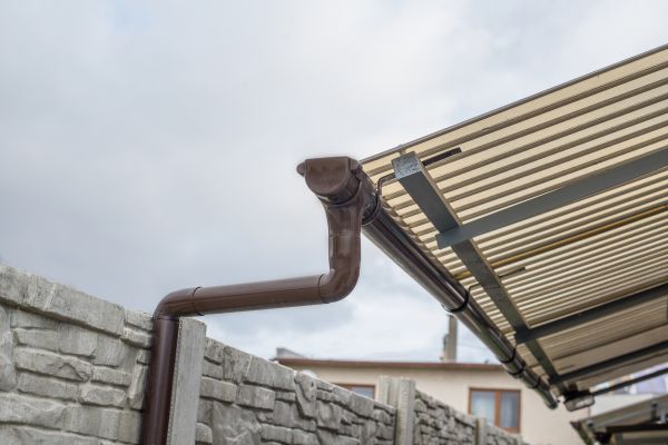Plastic Downspout Installation in Rockwall